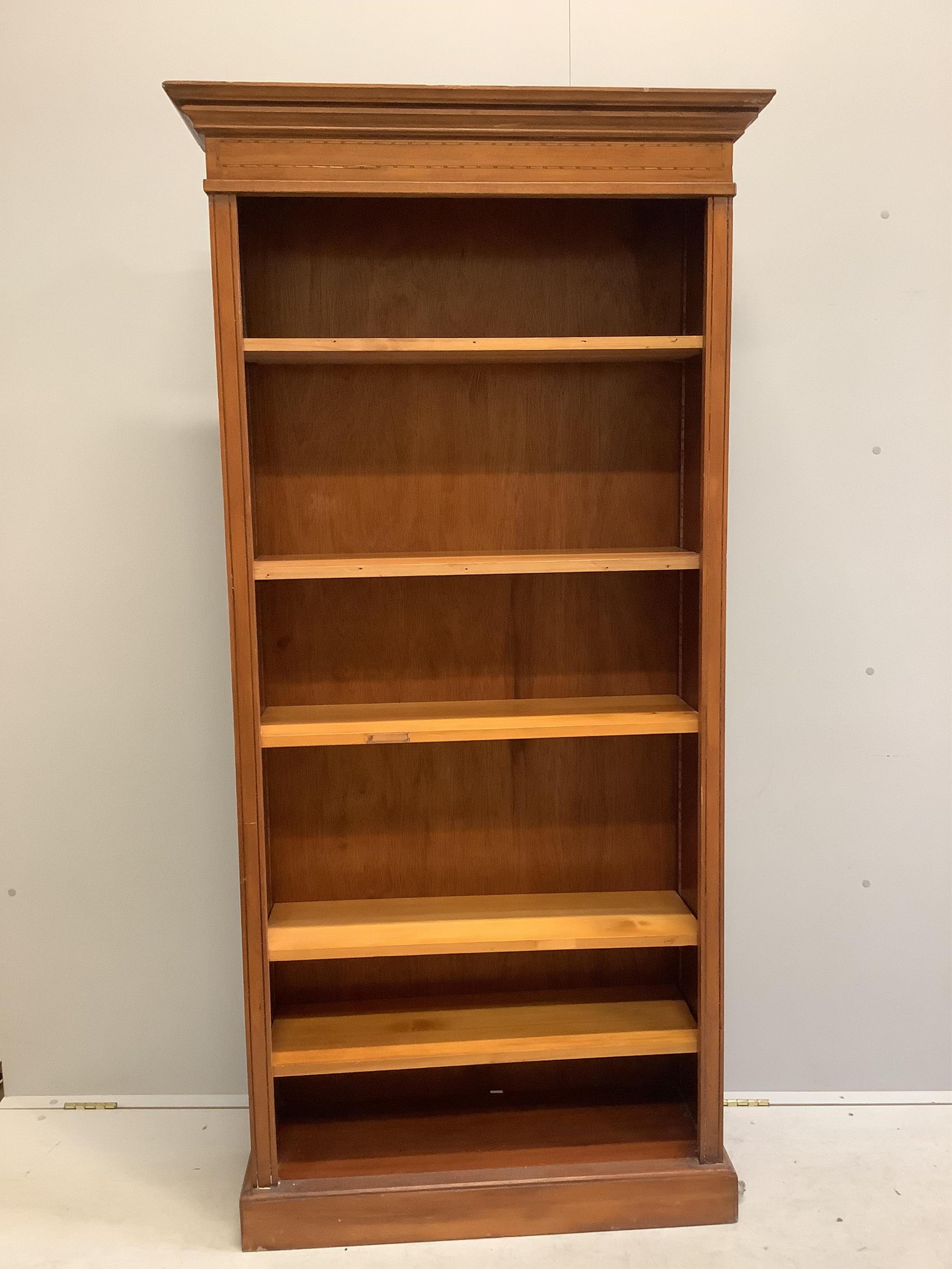 A reproduction Edwardian style open bookcase, width 90cm, depth 32cm, height 186cm. Condition - fair